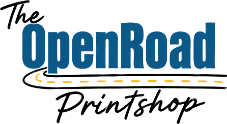A logo-style graphic reading 'The OpenRoad Printshop' with large blue 'OpenRoad' text, black script text, and a yellow dashed road line on a white background.